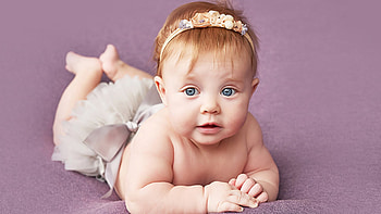 Grey Eyes Cute Girl Baby Is Lying Down On Light Purple Cloth Cute HD wallpaper