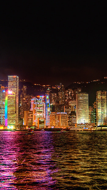 Night symphony, City lights spectacle, Glowing reflections, Urban enchantment HD phone wallpaper