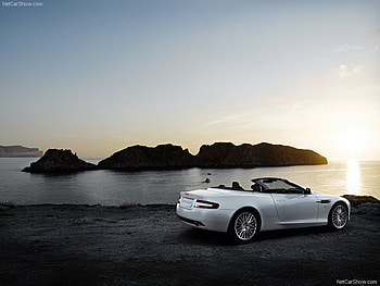 Aston Martin, sea, island, sunset, ocean HD wallpaper