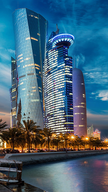 Evening skyline, Skyscrapers, Qatar city lights, Urban aesthetics HD phone wallpaper