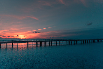 Sunset, bridge, sea, dark, nature HD wallpaper