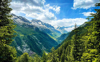 The Swiss Alps in Uri near Goescheneralp, valley, clouds, trees, sky, switzerland HD wallpaper