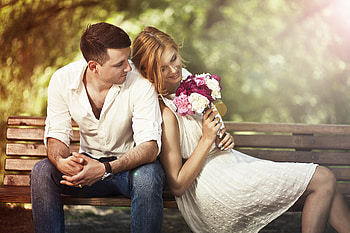 Couple Sitting On Bench With Flowers, love, couple, bench HD wallpaper