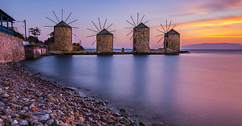 Windmill, coast, sunset, pebbles, sea HD wallpaper