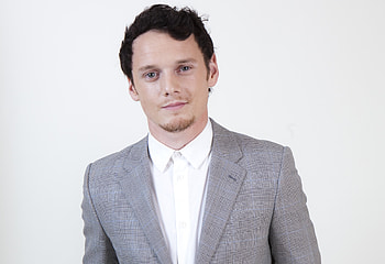 Anton Yelchin, background, Captivating presence, Movie moments HD wallpaper