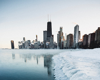 Winter, cityscape, frozen coast, lake, buildings HD wallpaper