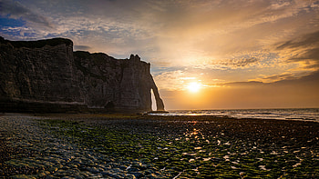 Golden Sunset Through Natural Stone Arch, golden, sunset, stone, sunrise, mountains, mountain, sea, nature HD wallpaper