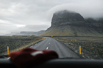 Explore the misty Icelandic landscape on a scenic road trip through dramatic highlands. HD wallpaper