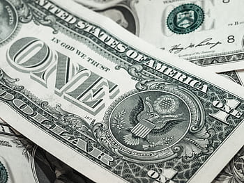 Detailed macro shot of a United States one dollar bill showing various design elements. HD wallpaper