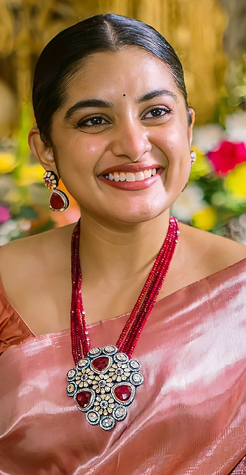 Nivetha Thomas, face, lip, Telugu_actress HD phone wallpaper