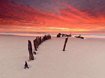 hot-burning-sky, sea, sand, hot, beach, scenery, wood, red, clouds, view, nature, sky, calm, wave HD wallpaper
