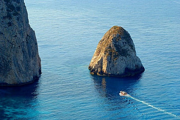 Between the rocks, island, boat, sea, greek, greece, , zakynthos, rocks, summer, pic, nature, waters HD wallpaper