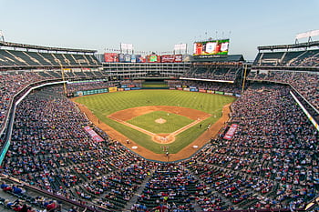 Aerial view of a lively baseball game at the iconic Globe Life Park filled with cheering fans. HD wallpaper