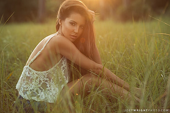 Enjoying The Evening, white, denim shorts, sitting on ground, brunette, lace top, long grass HD wallpaper