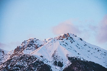 Scenic view of snow-capped mountains in Innsbruck, Austria during winter. HD wallpaper