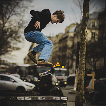 stock of man skateboarding, Real-life action, Authentic skateboarding moment, Candid shot HD phone wallpaper