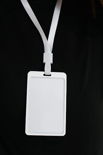 Blank white ID badge on a black background, perfect for business events. HD phone wallpaper