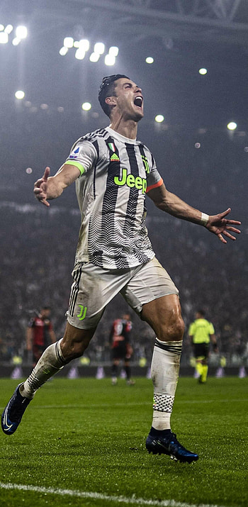 Cristiano Ronaldo, Sunlit background, Vibrant , Celeb icon HD phone wallpaper
