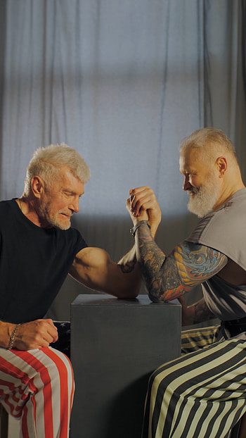 Elderly arm wrestlers, Friendly match, Inspiring video, Active aging HD phone wallpaper