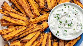Baked sweet potato fries, Ranch dip accompaniment, Clean Food Crush recipe, Healthy and tasty HD wallpaper