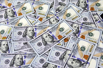 Pile of US hundred dollar bills depicting financial success and wealth. HD wallpaper