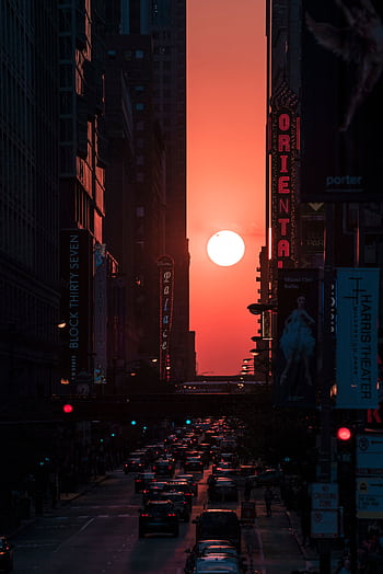 A breathtaking view of the sunset framed by skyscrapers in downtown Chicago, capturing the vibrant city life. HD phone wallpaper