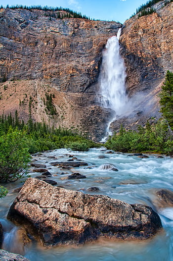 Stunning waterfall cascading down cliffs in Yoho National Park, Canada HD phone wallpaper