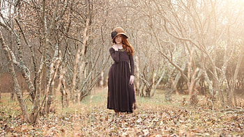 Cute Little Girl Is Standing In Forest Background Wearing Black Dress And Hat Cute HD wallpaper