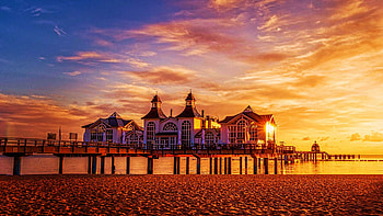 Pier at the Baltic Sea, Sellin, Island of Ruegen, sunset, germany, building, clouds, colors, sky, water HD wallpaper