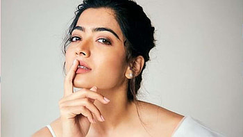 Beautiful Actress Rashmika Mandanna Is Wearing White Dress Having Finger On Lips Girls HD wallpaper