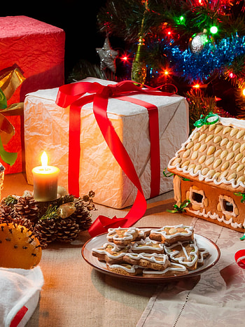 Candle-lit gingerbread house, Festive basket of treats, Christmas , Cozy and inviting HD phone wallpaper