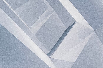 Abstract geometric design featuring minimalist shades of blue and grey with sharp angles. HD wallpaper