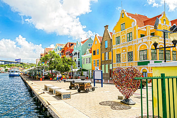 Paradise awaits, Sandals, Candy colored houses, Caribbean island HD wallpaper