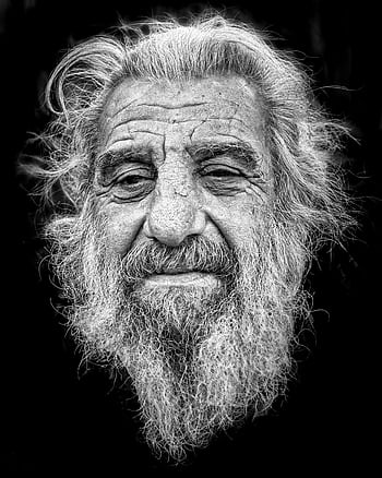 Black and white portrait of a senior man with a prominent beard and expressive features against a dark background. HD phone wallpaper