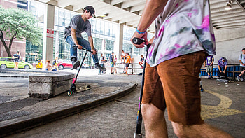 Millennials' extreme sport, Soaring popularity, Thrilling scootering trend, Rolling Stone's insight HD wallpaper