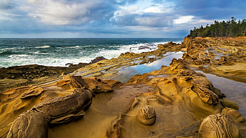 Beach and waves, Stone-covered shore, Rhythmic tides, Coastal charm HD wallpaper