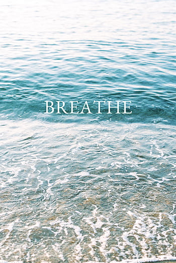 Serene ocean waves with 'Breathe' text inspire calm and reflection. HD phone wallpaper