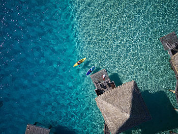 Aerial of Water Villa & Canoe Bora Bora, island, blue, tropical, tahiti, aerial, water, islands, ocean, sea, canoe, exotic, paradise, aqua, villa, lagoon, south pacific, turquoise, view, bora bora, polynesia HD wallpaper