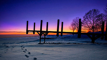 A dock over snow at St. Clair Metropark in Metro Detroit, Michigan, winter, snow, colors, landscape, trees, sky, usa, sunset HD wallpaper