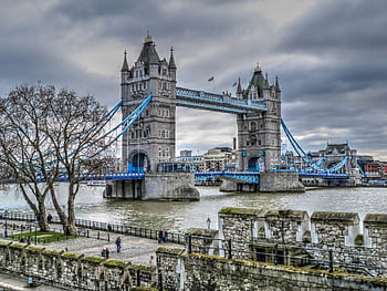 Scenic view of Tower Bridge over the Thames with cloudy sky in London. HD wallpaper