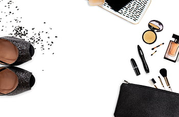 Flat lay of stylish shoes and beauty products, perfect for a fashionable lifestyle theme. HD wallpaper