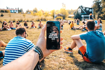 A smart with an inspirational message at a friendly outdoor gathering in Vilnius, Lithuania. HD wallpaper