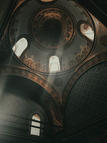 Intricate interior view of a historic Turkish dome with ornate architectural details and natural light filtering through. HD phone wallpaper