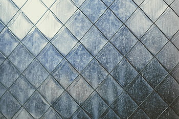 Close-up of a textured metal surface with geometric patterns, captured in Busan, South Korea. HD wallpaper