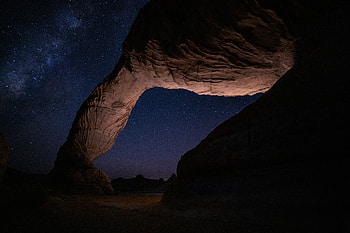 Large Rock Formation With Sky Full Of Stars, rocks, galaxy, stars, nature HD wallpaper