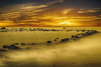 Yellow, sunset, coast, rocks HD wallpaper