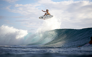 Professional surfers, Wave conquerors, Surfing skills, Ocean mastery HD wallpaper