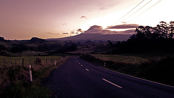 Sunset mountain, plymouth, set, taranaki, tree, mountain, rock, new plymouth, snow, new zealand, road, new, sun, sunset, pulze HD wallpaper