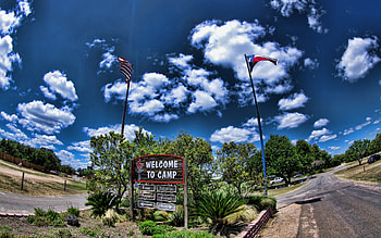 Welcome To Camp, blue, colorful, colors, peaceful, beautiful, welcome, flags, flag, camp, clouds, trees, view, road, nature, sky HD wallpaper