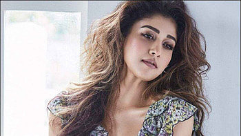 Actress Nayanthara Is Posing For A Wearing Colorful Dress Standing In White Wall Background Girls HD wallpaper